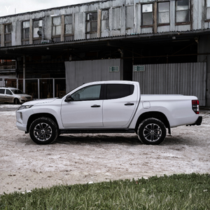 Professional white ute in modern city setting