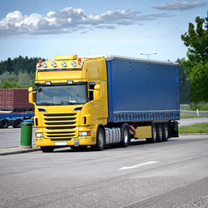 Modern blue and yellow semi-truck on road